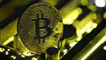 Bitcoin plunges below 000, heads