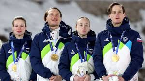 Slovenian siblings win Olympic gold in ski jumping team event