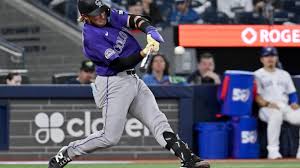 Johnston hits a 2-run homer as the Rockies rout the Blue Jays 14-5 for their 1st win of the season