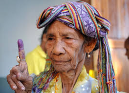 Over the last half-century, peace and stability have remained elusive goals in East Timor, officially known the Democratic Republic of Timor-Leste. - East-Timorese-Woman-after-Voting