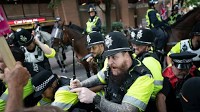 U.K. migrant protests spark angry confrontations as government scrambles to respond