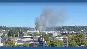 Seattle fire crews battling large commercial warehouse fire in Ballard