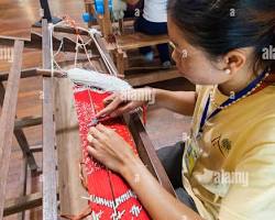 Image of Cambodian artisans weaving hats