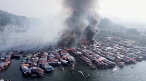 Massive Fire Devastates Malaysian Coastal Village