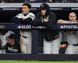 Manny Machado watches a deep fly ball fall short during the NLDS