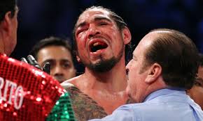 Antonio Margarito loses to Miguel Cotto. Antonio Margarito, with a closed right eye, reacts after referee Steve Smoger stops his fight against Miguel Cotto ... - Antonio-Margarito-loses-t-007