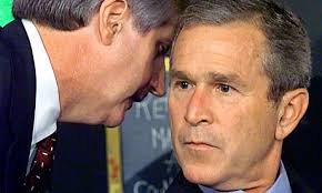 Andrew Card and George Bush. On 11 September 2001, George Bush receives the news that the World Trade Centre in New York has been attacked. - Andrew-Card-and-George-Bu-007