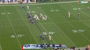 Talanoa Hufanga returns an interception for a touchdown against the Los Angeles Rams