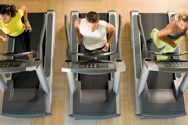 People jogging on treadmills