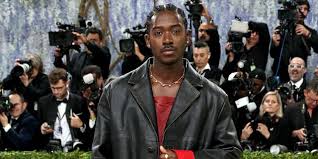Damson Idris Makes a Statement in an Oversized Prada Leather at the Met Gala