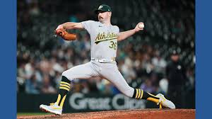 Butler drives in go-ahead run, A's pitchers combine for 18 strikeouts in 7-4 win over Mariners