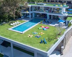 family enjoying their vacation in a childfriendly villa resmi