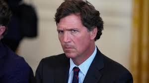 Tucker Carlson Calls for Immediate Removal of Donald Trump from Office