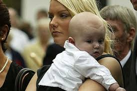 Joanne McAleese (pic: SWNS). Soldier&#39;s widow Joanne McAleese hugs her baby son yesterday at the funeral of the &quot;greatest man there ever was&quot;. - joanne-mcaleese-pic-swns-45392381