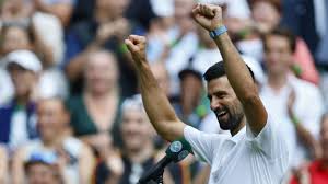 Novak Djokovic celebrates his 100th match win at Wimbledon