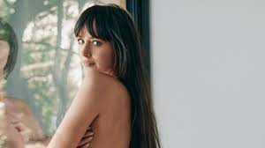 Dakota Johnson poses topless in Calvin Klein underwear as she bares all in her raciest shoot to date