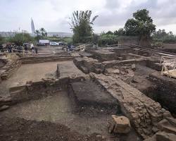 Image of photo of an ancient excavation site with unearthed artifacts and ruins