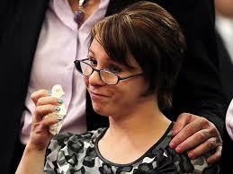 Michelle Knight, one of the three kidnapped women, pauses to wipe away tears as she reads her statements during the sentencing of her accused kidnapper ... - rtx1278h