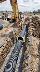 Underground stormwater pipeline installation at construction ...