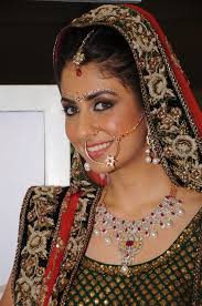 The Muslim bride was demure yet stylish and confident in royal shades of gold and green. - Lakme-Salon-Punjabi-Bride-Look