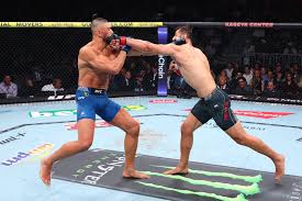 Joe Rogan declares ‘this fight sucks’ as Johnny Walker and Dominick Reyes bore fans at UFC 327