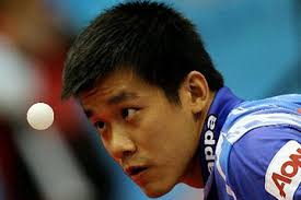 Agence France-Presse/Getty Images: Peng Tang of Hong Kong eyes the ball during their Table Tennis World Team Cup 2010 quater-final match in Dubai on ... - OB-TT700_tangpe_E_20120715222545