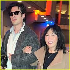 Hudson Williams Wears Electric Lemon Pants to Knicks Game with Mom