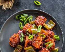 Paneer cubes coated in spice mixture