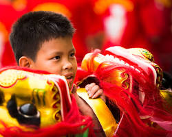 A vibrant dragon dance performance during Chinese New Year in Cambodia