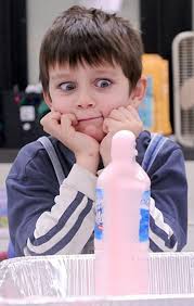 Melanie Sochan|The Saginaw NewsFirst grader Clyde Craft, 6, son of Loyd and Amy Craft of St. Charles watches in amazement as the &quot;elephant toothpaste&quot; he ... - large_mks.St.Charlessciencenight1