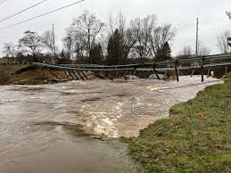 Flood updates: Portions of six roads closed in Grand Traverse County