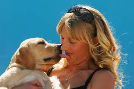 Anastasia Rodionova of Australia poses with a labrador off court during day one of the 2009 Australian Open at Melbourne Park on ... - Off%2BCourt%2B2009%2BAustralian%2BOpen%2B32acezOE31_l