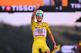 Tadej Pogačar celebrates victory at Tour de France