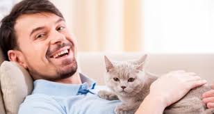 Image result for IMAGE OF A MAN AND HIS CAT