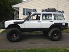 Finished my buddies inch lift on his white XJ today. Couple of bad