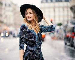 صورة woman wearing a stylish hat