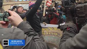 Small group of anti-Islam protesters met by large crowd of counterprotesters in downtown Minneapolis