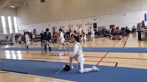 Fencer Kneels in Protest Against Transgender Opponent, Igniting Debate