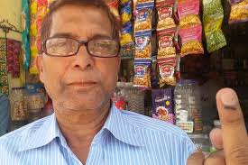 ... inked finger outside a shop in Kishanganj, a town in the eastern state of Bihar that borders Nepal and Bangladesh. Mukesh Jagota/The Wall Street Journal - BN-CN041_ihashm_G_20140424092354