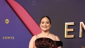 Lily Gladstone Wears a Decorative Bronze Breastplate on the 2024 Emmys Red 
Carpet