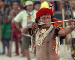 Image of Indigenous people hunting with bows and arrows