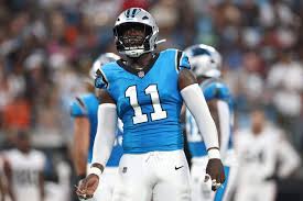Panthers pass rusher Nic Scourton leaves field on cart after injuring knee
