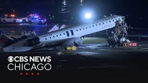 2 pilots killed when plane hits fire truck at New York's LaGuardia Airport