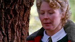As he waits, Foyle looks around him and catches sight of Barbara standing beside a tree ... - 303220a