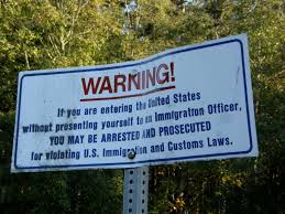 Image result for pictures of sign: warning you are entering the United States...