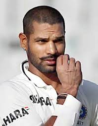 Shikhar Dhawan walks off the field after the end of the third day&#39;s play of 3rd cricket Test match against Australia in Mohali. (PTI) - 89d31dbb-70ff-4a7d-81cb-0cdd2a3d16b2HiRes