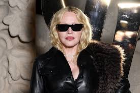 Madonna Playfully Spanks Nightclub Owner in Front of Addison Rae