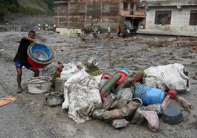 Singapore's Mercy Relief prepares emergency aid for flood victims in Nepal and Philippines; deadly floods and cyclones have killed hundreds