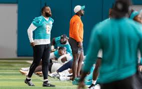 Brewer, two other Dolphins who missed many August practices, update their 
situations