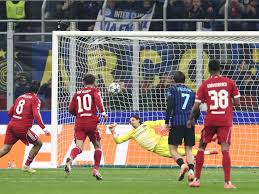 Liverpool snatch win at Inter Milan with late penalty from Szoboszlai